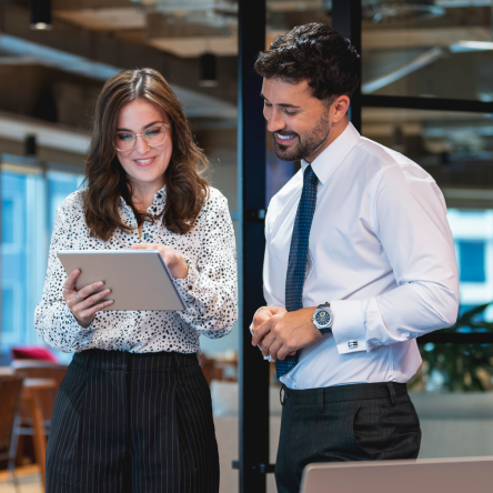 Executives reviewing term life insurance details.