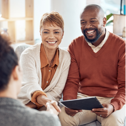 Financial professional reviewing information about Protective Indexed Choice NY UL with a couple.