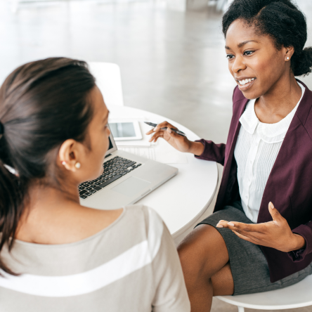 A financial professional tells her client about the new rates for Protective Indexed Choice UL.