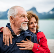 A couple looking happy enjoying their retirement.