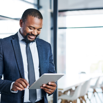 A financial professional using a tablet to see how to submit life insurance business with Protective