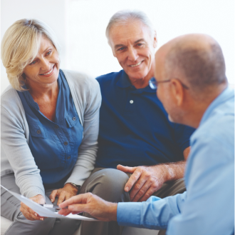 A financial professional discussing the benefits of Protective Market Defender Two annuity with his clients.