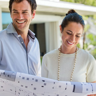 Smiling couple who are happy about their cost-effective, tax-deferred investment in a Protective Variable Annuity Investors Series contract.