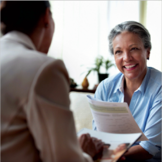 A financial professional meeting with a client to discuss Medicare.
