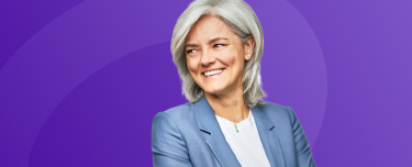 A financial professional smiling confidently