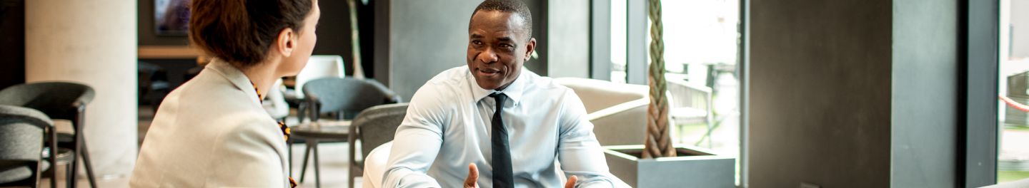 Financial professional and client discussing retirement planning basics, options and Protective fixed annuities