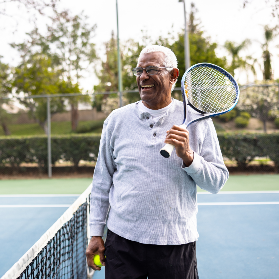 Man enjoys a tennis match, confident Protective Aspirations variable annuity can help him reach his complex goals