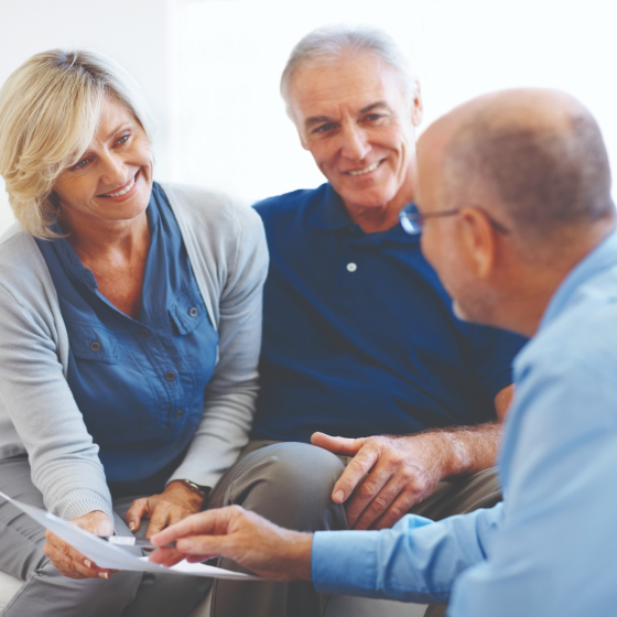 A financial professional discussing the benefits of Protective Market Defender Two annuity with his clients.