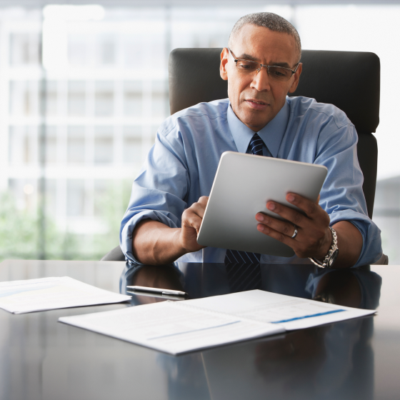 A financial professional reviewing details about Protective Executive UL on a tablet