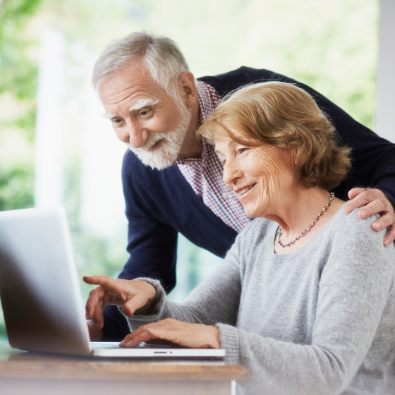 Couple reviewing product specs for Protective Guaranteed Income Indexed Annuity
