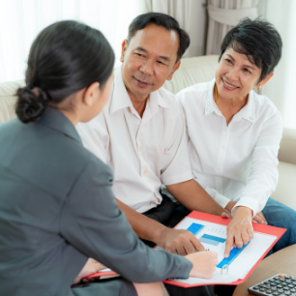 A financial professional sharing information about whole life insurance with her clients.