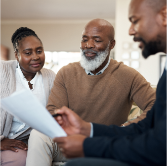 A financial professional conducting a life insurance needs check up with a client.