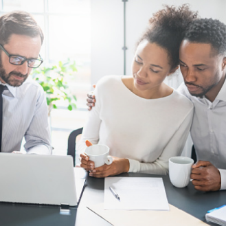 A financial professional sharing information about variable universal life insurance with his clients.